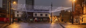 Image of Keel Square Christmas light canopy at night