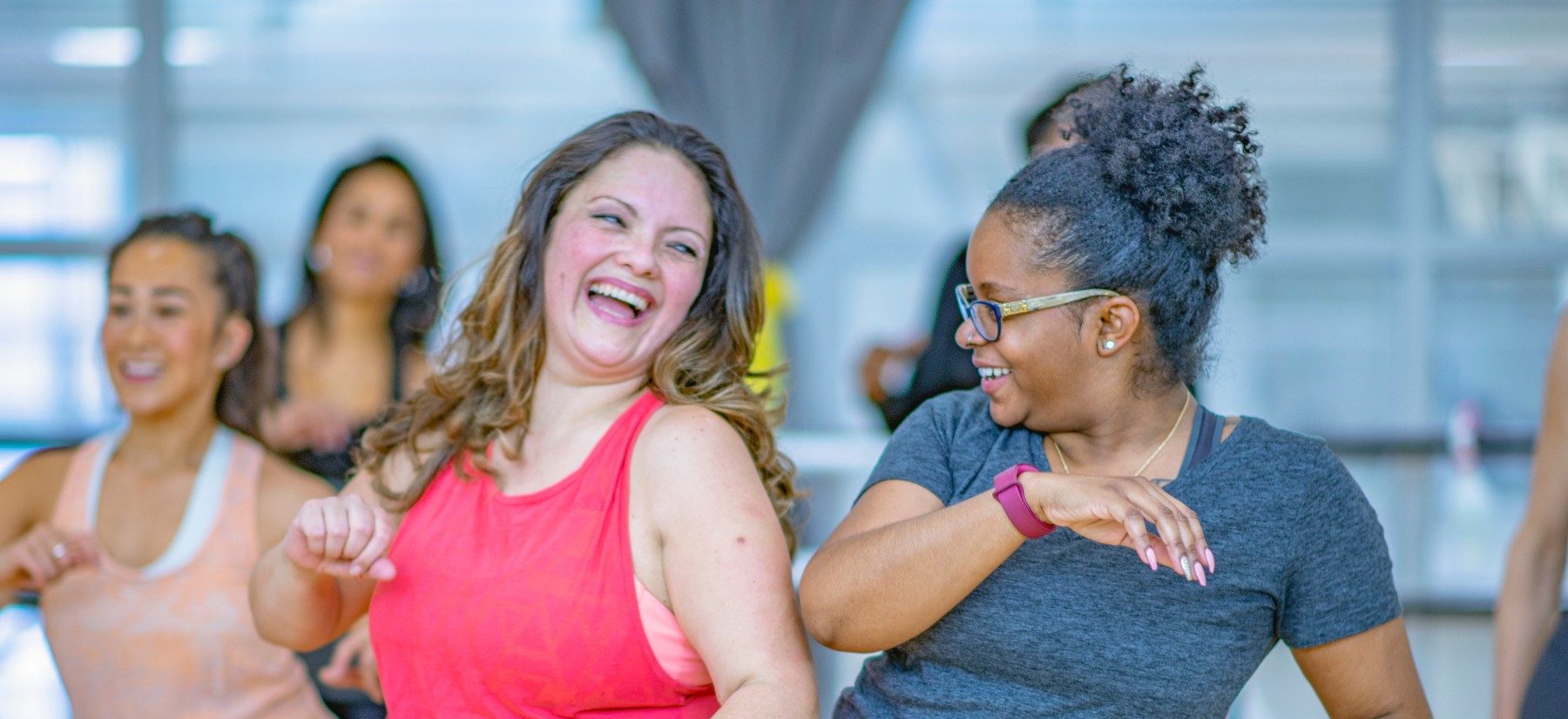 Women having fun exercising