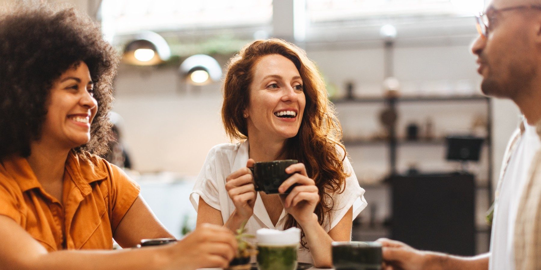 parents and caregivers chatting with a coffee